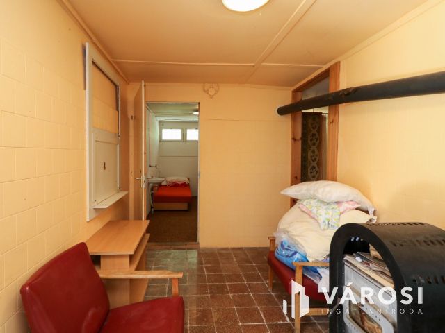 2219 nm-es fejlesztési telek nyaralóval Balatonfenyvesen